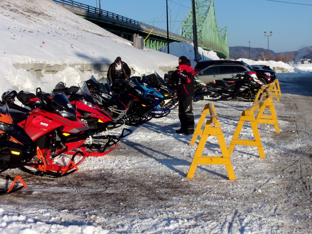 Quality Inn Parking lot, Bridge to Quebec in the background (Greg and Jon) New Brunswick Trip – Feb 2020